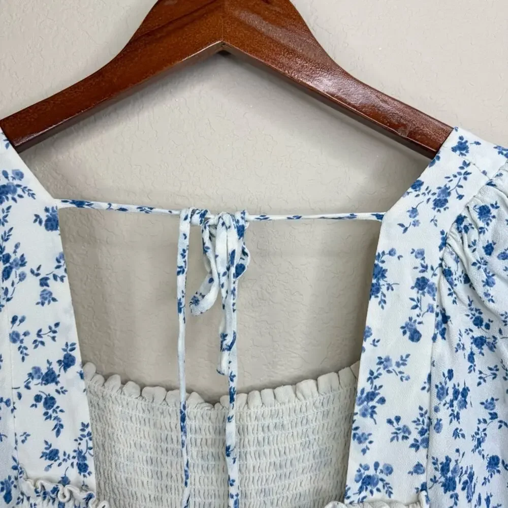 REFORMATION Braelyn Top Blue White Smocked Floral Pull On Spring Women’s Sz L